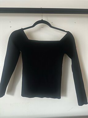 Good american Black Ribbed off the shoulder top.